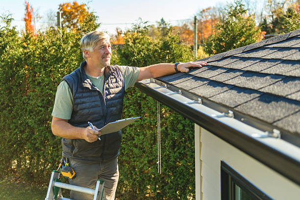 Professional Roof Repair technician working in Murdock, NE